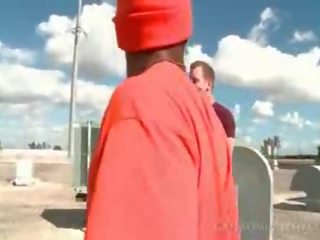 Afro geý blowing ak member on knees